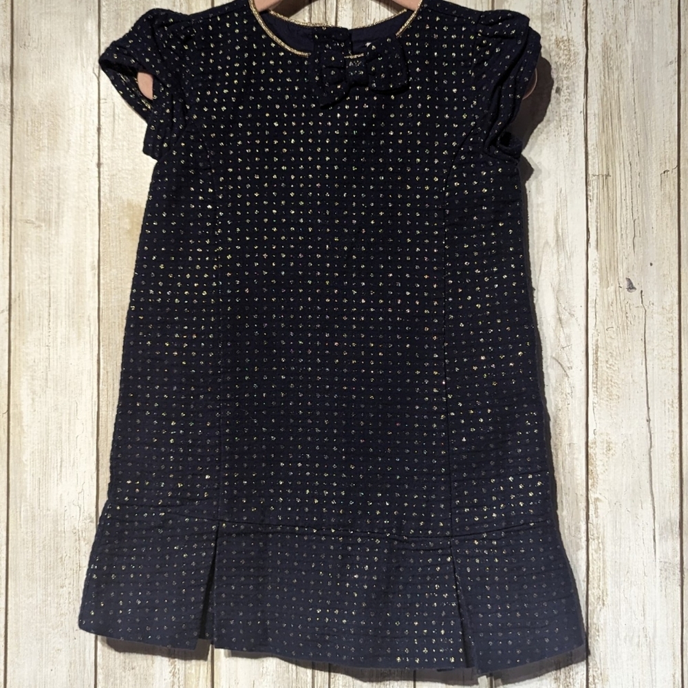 Gymboree.. golden dots thought-out;entire dress. Super cute size 18-24mnts